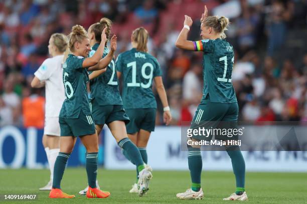 Alexandra Popp of Germany celebrates their team's second goal with teammate Linda Dallmann during the UEFA Women's Euro England 2022 group B match...