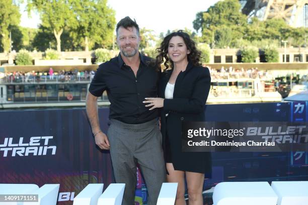 David Leitch and Kelly McCormick attend the "Bullet Train" Photocall at Bateau L'Excellence, Port Debilly on July 16, 2022 in Paris, France.