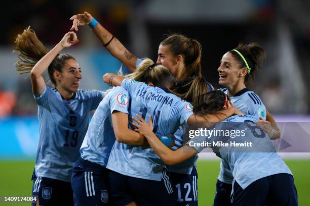 Marta Cardona of Spain celebrates scoring their side's first goal with teammates during the UEFA Women's Euro 2022 group B match between Denmark and...