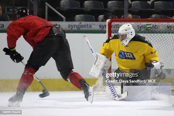 Aaron Palushaj of Team Carbonneau shoots against Jacob Theut of Team Mullen during 3ICE Week Five at Budweiser Gardens on July 16, 2022 in London,...