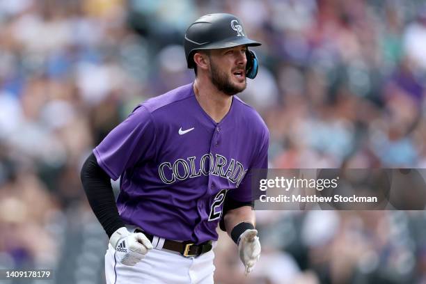 Kris Bryant of the Colorado Rockies runs to first base after hitting a RBI single against the Pittsburgh Pirates in the fifth inning at Coors Field...