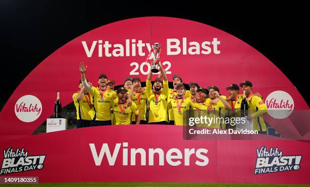 Hampshire captain James Vince lifts the Vitality Blast trophy with teammates afterthe Vitality Blast Final match between Lancashire Lightning and...