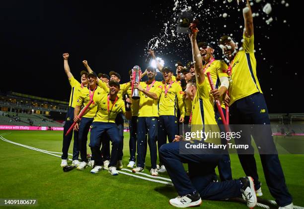 James Vince of Hampshire Hawks lfits the Vitality Blast Trophy alongside their team mates following the Vitality Blast Final match between Lancashire...