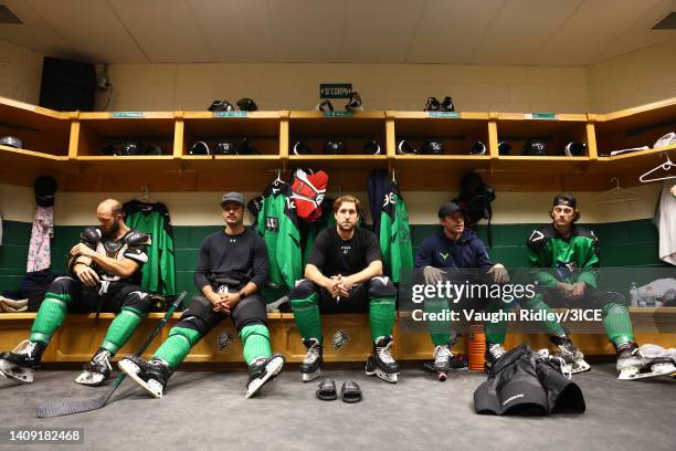 Chris Mueller of Team Murphy and teammates sit in the locker room prior to the start of 3ICE Week Five at Budweiser Gardens on July 16, 2022 in...