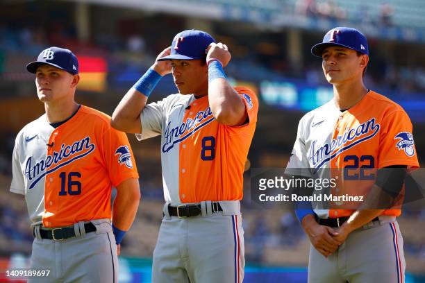 Curtis Mead, Dustin Harris and Jack Leiter of the American League line up before the SiriusXM All-Star Futures Game at Dodger Stadium on July 16,...