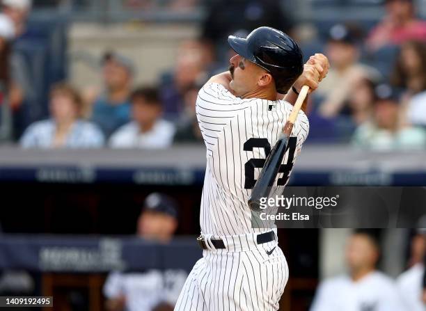 Matt Carpenter of the New York Yankees hits a three run home run in the first inning against the Boston Red Sox at Yankee Stadium on July 16, 2022 in...