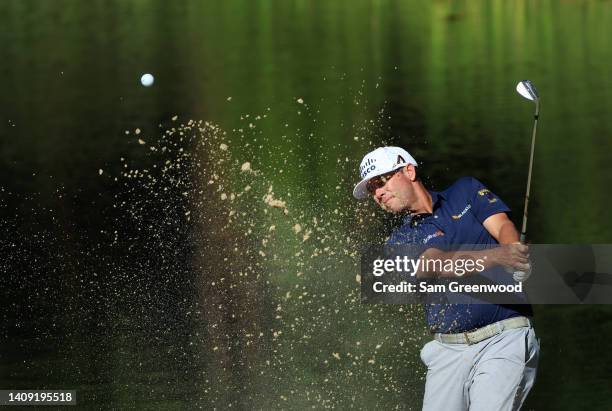 Chez Reavie of the United States plays a shot from a bunker on the 15th hole during the third round of the Barracuda Championship at Tahoe Mountain...