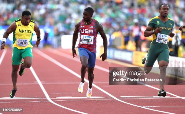 Yohan Blake of Team Jamaica, Trayvon Bromell of Team United States and Akani Simbine of Team South Africa compete in the Men’s 100m Semi-Final on day...