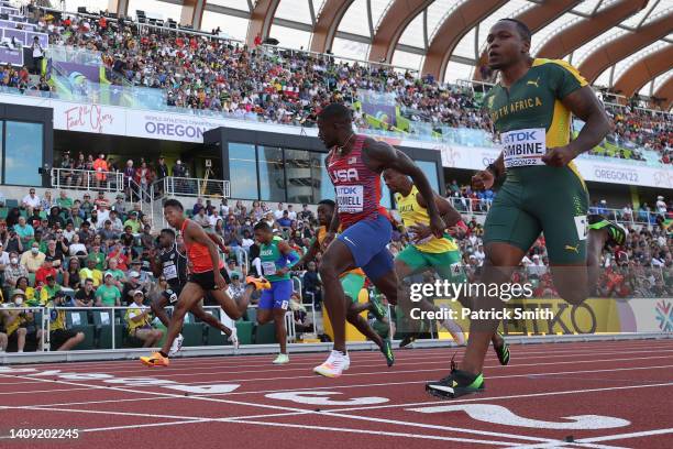 Abdul Hakim Sani Brown of Team Japan, Trayvon Bromell of Team United States and Akani Simbine of Team South Africa compete in the Men’s 100m...
