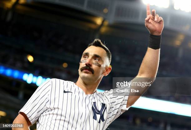 Matt Carpenter of the New York Yankees comes up for the curtain call after he hit a three run home run in the fifth inning against the Boston Red Sox...