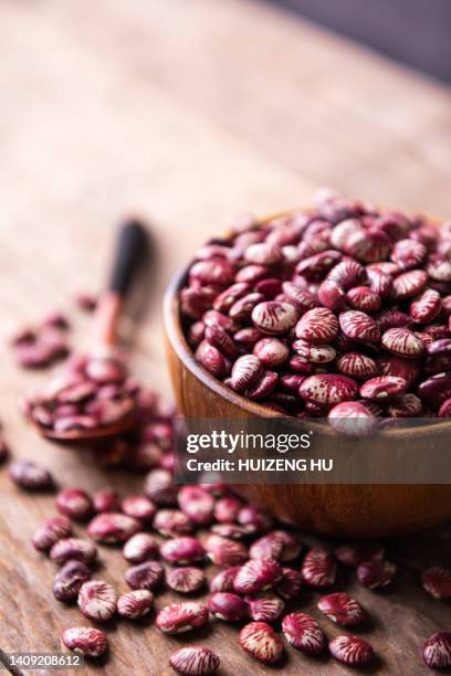 dry red beans on wooden table, vegetarian and vegan food - red beans stock pictures, royalty-free photos & images