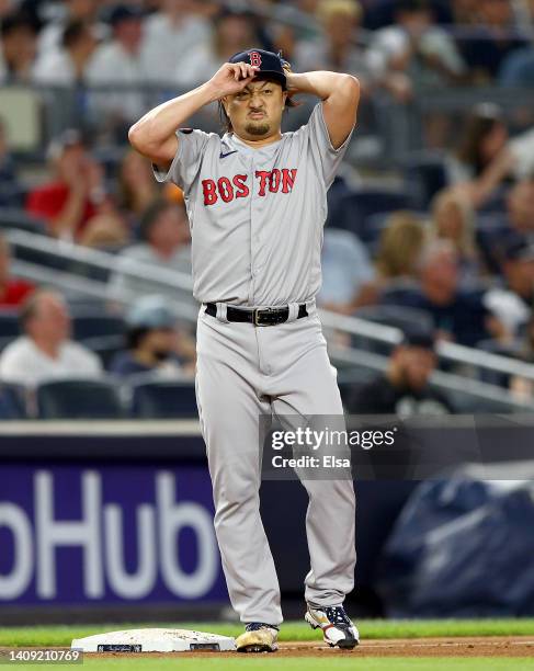 Hirokazu Sawamura of the Boston Red Sox reacts in the seventh inning against the New York Yankees at Yankee Stadium on July 16, 2022 in the Bronx...