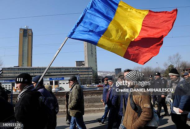 Romanian MIners stage a demonstration in Petrosani city, some 350 kms west of Bucharest on March 8, 2012. More than 3,000 coal miners from the Jiu...