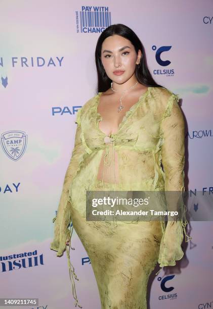 Yumi Nu arrives at the Sports Illustrated Swimsuit Runway Show during Paraiso Miami Beach on July 16, 2022 in Miami Beach, Florida.
