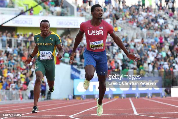 Akani Simbine of Team South Africa and Fred Kerley of Team United States compete in the Men’s 100m Final on day two of the World Athletics...