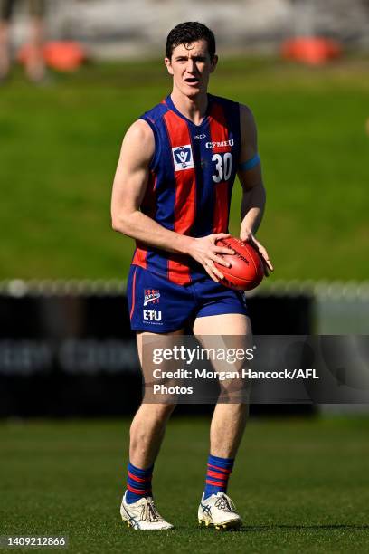 Ethan Phillips of the Borough takes possession of the ball during the round 16 VFL match between Port Melbourne and Collingwood at ETU Stadium on...