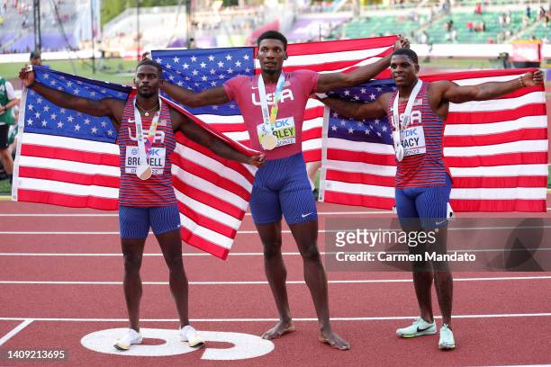 Bronze medalist Trayvon Bromell of Team United States, gold medalist Fred Kerley of Team United States, and silver medalist Marvin Bracy of Team...