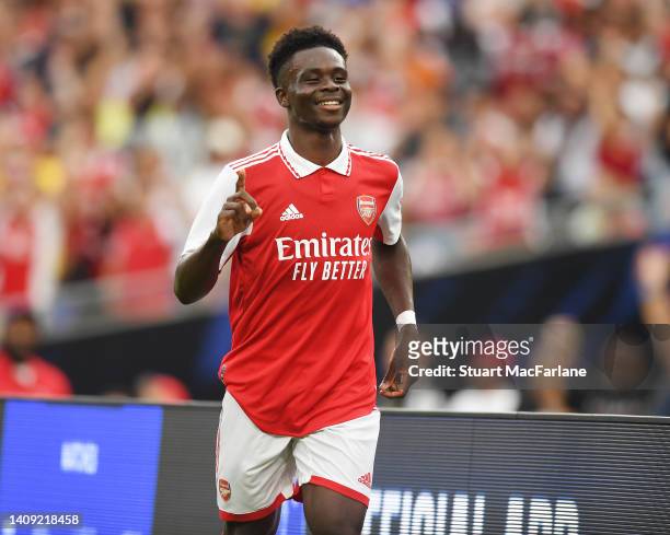 Bukayo Saka celebrates scoring the 2nd Arsenal goal during a pre season friendly between Arsenal and Everton at M&T Bank Stadium on July 16, 2022 in...