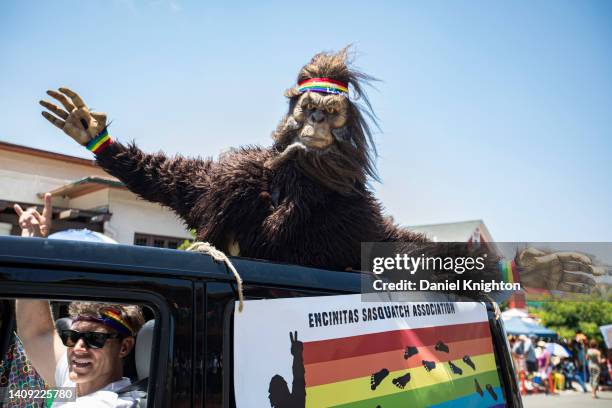 Person in a Sasquatch costume rides with the Encinitas Sasquatch Association at 2022 San Diego Pride Parade on July 16, 2022 in San Diego, California.