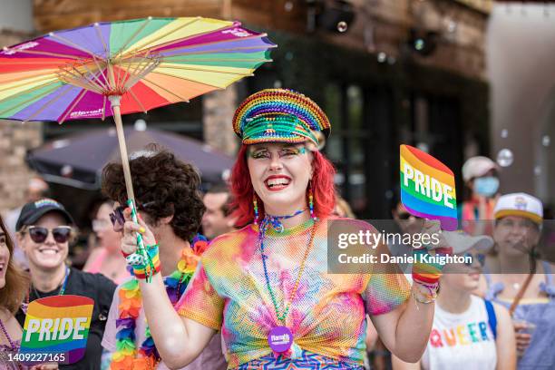 Attendees cheer on participants at 2022 San Diego Pride Parade on July 16, 2022 in San Diego, California.