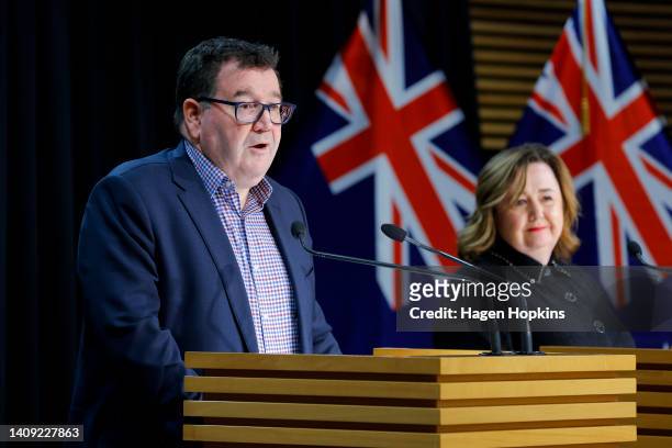 Finance Minister Grant Robertson speaks to media while Minister of Housing Dr Megan Woods looks on during a press conference at Parliament on July...