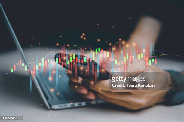 business people use smartphone to analyze data and graph economic growth. - financial graph bildbanksfoton och bilder