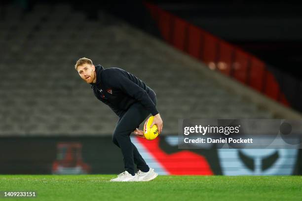 Dyson Heppell of the Bombers warms up before the round 18 AFL match between the Essendon Bombers and the Gold Coast Suns at Marvel Stadium on July...