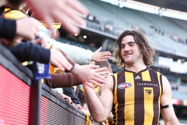 Jai Newcombe of the Hawks acknowledges the fans after the round 18 AFL match between the Hawthorn Hawks and the West Coast Eagles at Melbourne...