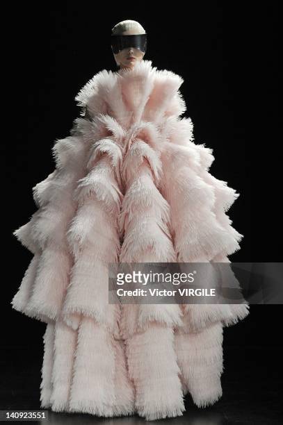 Model walks the runway during the Alexander McQueen as part of Paris Fashion Week Womenswear Fall/Winter 2012 show at Salle Wagram on March 6, 2012...