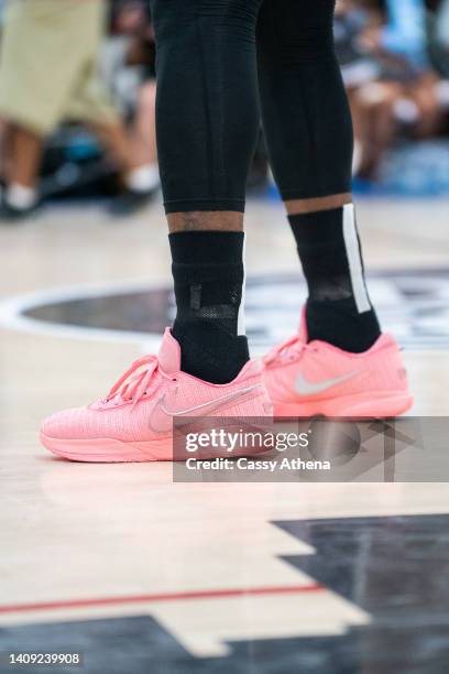 LeBron James shows off his new sneaker, the LeBron 20, at the Drew League Pro-Am on July 16, 2022 in Los Angeles, California.