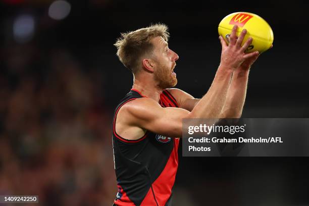 Dyson Heppell of the Bombers takes a mark during the round 18 AFL match between the Essendon Bombers and the Gold Coast Suns at Marvel Stadium on...