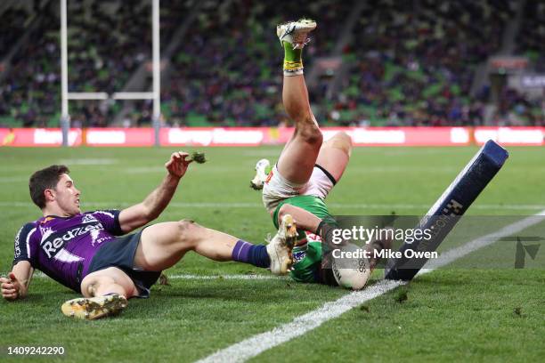 Jordan Rapana of the Raiders dives to score a try before being overturned as no try during the round 18 NRL match between the Melbourne Storm and the...