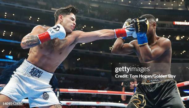 Javier Fortuna and Ryan Garcia exchange punches during their Super Light weight 12 rounds fight at Crypto.com Arena on July 16, 2022 in Los Angeles,...