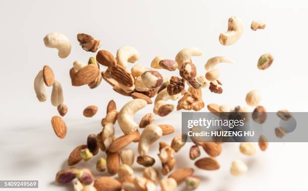 Falling Walnuts 702 Nuts Falling Stock Photos, High-Res Pictures, and Images - Getty Images