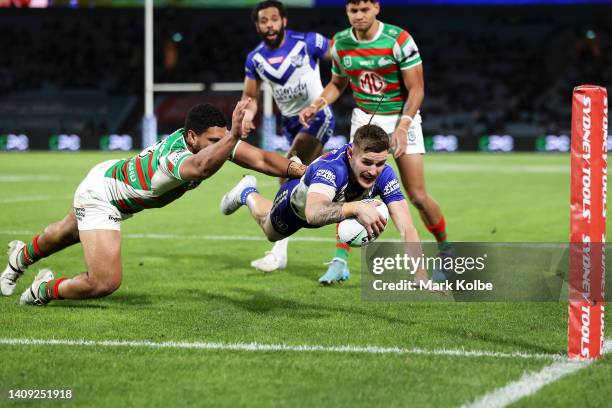 Declan Casey of the Bulldogs scores a try during the round 18 NRL match between the Canterbury Bulldogs and the South Sydney Rabbitohs at Stadium...