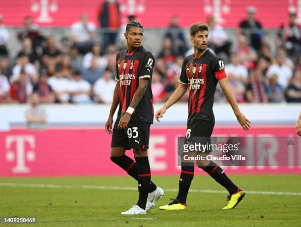 Matteo Gabbia and Emil Roback of AC Milan in action during the pre-season friendly match between 1. FC Köln and AC Milan on July 16, 2022 in Cologne,...