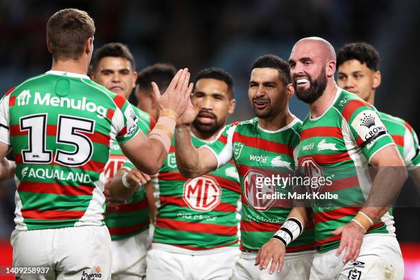 Cody Walker of the Rabbitohs celebrates with his team mates after scoring a tryduring the round 18 NRL match between the Canterbury Bulldogs and the...