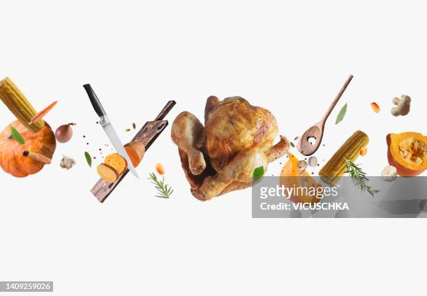 flying thanksgiving food and  ingredients and kitchen utensils at white background. creative food - vegetables white background stock pictures, royalty-free photos & images