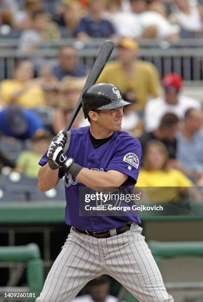 Garrett Atkins of the Colorado Rockies bats against the Pittsburgh Pirates during a Major League Baseball game at PNC Park on August 3, 2003 in...