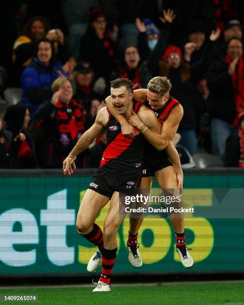 Sam Draper of the Bombers celebrates kicking a goal during the round 18 AFL match between the Essendon Bombers and the Gold Coast Suns at Marvel...