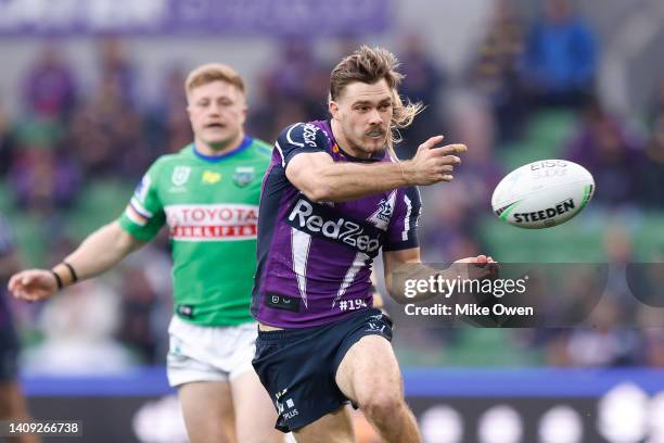 Ryan Papenhuyzen of the Storm passes the ball during the round 18 NRL match between the Melbourne Storm and the Canberra Raiders at AAMI Park, on...