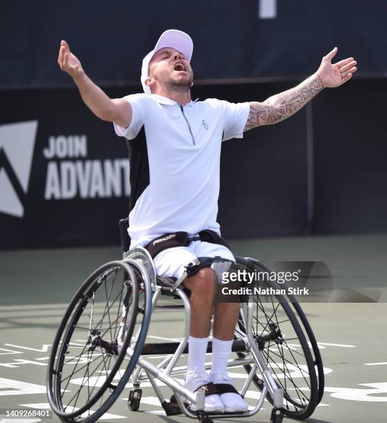 Andy Lapthorne of Great Britain celebrates after he wins the British Open Quad singles trophy after beating Heath Davidson of Australia during day...
