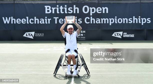 Andy Lapthorne of Great Britain poses with the British Open Quad singles trophy after beating Heath Davidson of Australia during day six of the...