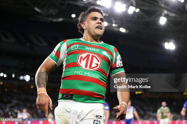 Latrell Mitchell of the Rabbitohs celebrates after Alex Johnston of the Rabbitohs scored a try during the round 18 NRL match between the Canterbury...