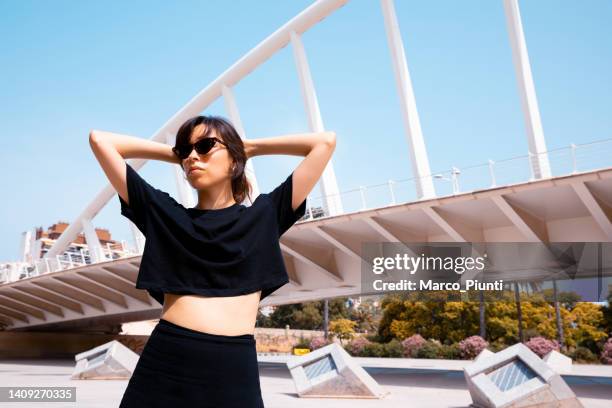 young woman with cool attitude in the city - tshirt template stock pictures, royalty-free photos & images