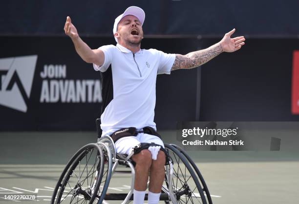 Andy Lapthorne of Great Britain celebrates after he wins the British Open Quad singles trophy after beating Heath Davidson of Australia during day...