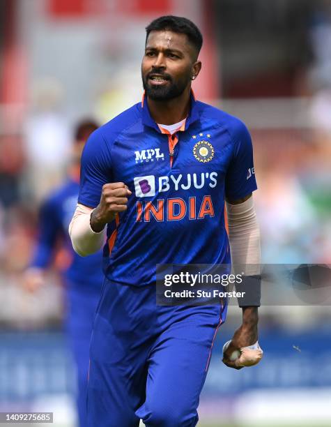 India bowler Hardik Pandya celebrates after taking the catch off his own bowling to dismiss England batsman Ben Stokes during the 3rd Royal London...