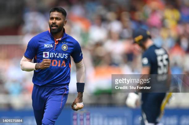 India bowler Hardik Pandya celebrates after taking the catch off his own bowling to dismiss England batsman Ben Stokes during the 3rd Royal London...