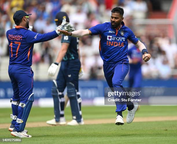 India bowler Hardik Pandya celebrates after taking the catch off his own bowling to dismiss England batsman Ben Stokes during the 3rd Royal London...