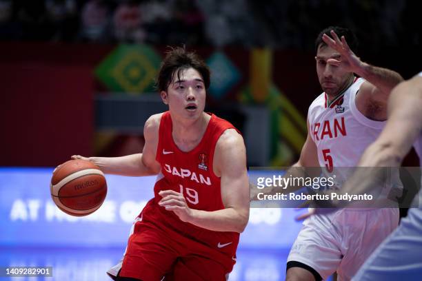 Yudai Nishida of Japan dribbles the ball during the FIBA Asia Cup Group C game between Iran and Japan at Istora Gelora Bung Karno on July 17, 2022 in...